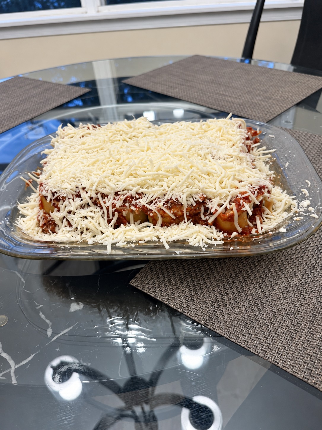 The cheese-topped dish before baking.